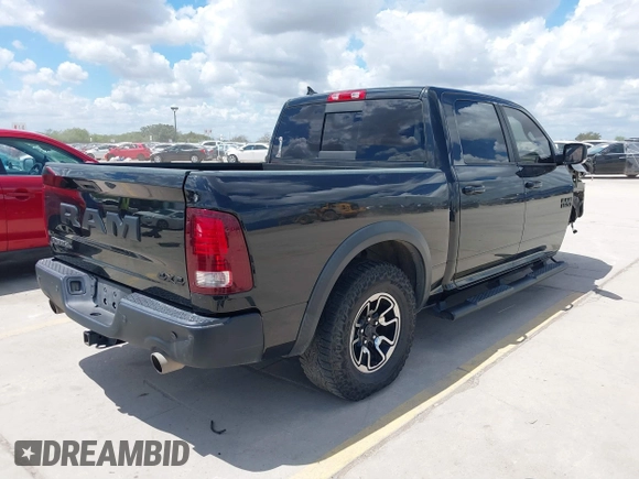 2017 Ram 1500 Rebel with VIN 1C6RR7YT5HS502546, listed as a IAAI auction lot 40218006 with 118,546 mi miles and . Bid and sale history available at DreamBid. Image 4.