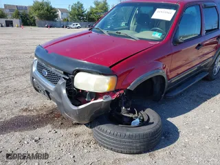 2004 Ford Escape XLT with VIN 1FMCU931X4KB19738, listed as a IAAI auction lot 41925561 with 220,674 mi miles. Bid and sale history available at carsss.com. Image 6.