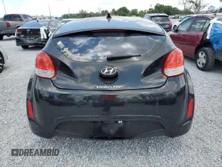 2013 Hyundai Veloster w/Black Int z VIN KMHTC6ADXDU157196, wystawiony jako Copart lot #58091015 z przebiegiem 136 201 mil mil oraz Szkoda całkowita • Salvage title. Historia ofert i sprzedaży dostępna na DreamBid. Obrazek 6.