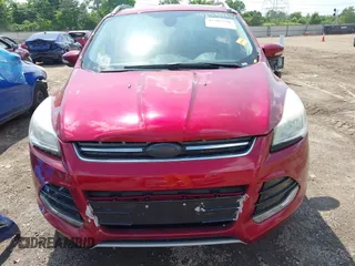2015 Ford Escape Titanium z VIN 1FMCU9J91FUC58933, wystawiony jako IAAI lot #42583736 z przebiegiem 147 359 mil mil oraz . Historia ofert i sprzedaży dostępna na DreamBid. Obrazek 12.