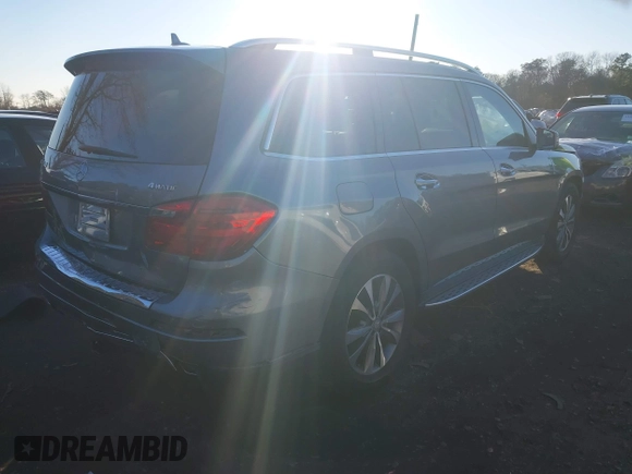 2015 Mercedes-Benz GL-Class GL 450 with VIN 4JGDF6EEXFA471143, listed as a IAAI auction lot 41062987 with 134,674 mi miles. Bid and sale history available at carsss.com. Image 4.