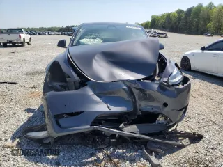 2022 Tesla Model Y Long Range z VIN 7SAYGDEE9NA014319, wystawiony jako Copart lot #53003555 z przebiegiem Nie podano mil oraz Szkody całkowita. Historia ofert i sprzedaży dostępna na DreamBid. Obrazek 5.
