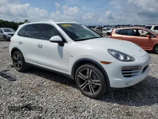 2013 Porsche Cayenne Diesel with VIN WP1AF2A27DLA22627, listed as a Copart auction lot 61939495 with 148,810 mi miles and Salvage title. Bid and sale history available at DreamBid. Image 4.