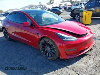 2021 Tesla Model 3 Performance with VIN 5YJ3E1EC7MF997237, listed as a IAAI auction lot 41387544 with 64,450 mi miles and . Bid and sale history available at carsss.com. Image 1.
