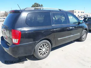 2012 Kia Sedona EX with VIN KNDMH4C75C6425709, listed as a IAAI auction lot 41879455 with 201,086 mi miles. Bid and sale history available at carsss.com. Image 4.