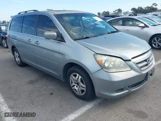 2007 Honda Odyssey EX-L with VIN 5FNRL38607B045797, listed as a IAAI auction lot 41624734 with 261,343 mi miles. Bid and sale history available at carsss.com. Image 1.