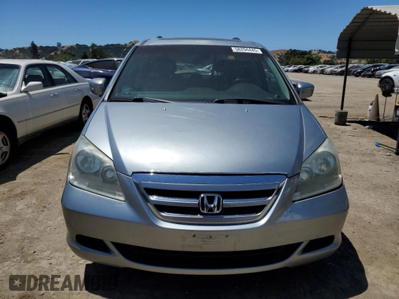 2006 Honda Odyssey EX-L z VIN 5FNRL38756B020403, wystawiony jako Copart lot #58294445 z przebiegiem 248 529 mil mil oraz Szkoda całkowita • Salvage title. Historia ofert i sprzedaży dostępna na DreamBid. Obrazek 5.