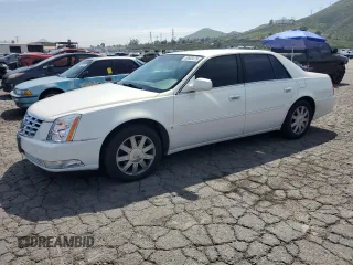2006 Cadillac DTS 1SB z VIN 1G6KD57Y36U144765, wystawiony jako Copart lot #50603475 z przebiegiem 105 637 mil mil oraz Czysty tytuł • Clean title. Historia ofert i sprzedaży dostępna na DreamBid. Obrazek 1.