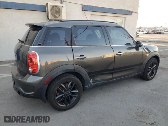 2014 MINI Countryman S with VIN WMWZC3C59EWP29137, listed as a Copart auction lot 79721804 with 124,871 mi miles and Salvage title. Bid and sale history available at DreamBid. Image 3.