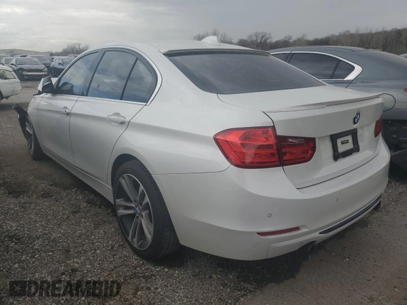 2015 BMW 3 Series 335i xDrive with VIN WBA3B9C52FF588814, listed as a Copart auction lot 48379495 with 73,302 mi miles and Salvage title. Bid and sale history available at DreamBid. Image 2.
