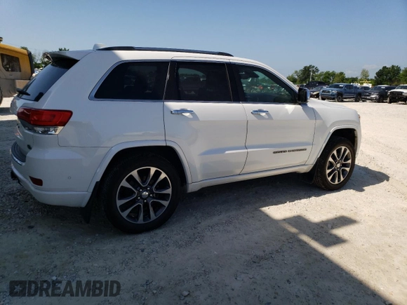 2018 Jeep Grand Cherokee Overland z VIN 1C4RJFCG4JC425589, wystawiony jako Copart lot #61775775 z przebiegiem 102 040 mil mil oraz Szkoda całkowita • Salvage title. Historia ofert i sprzedaży dostępna na DreamBid. Obrazek 3.