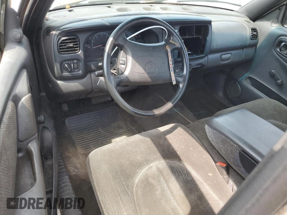 1999 Dodge Dakota SLT z VIN 1B7FL26X3XS170126, wystawiony jako Copart lot #54621095 z przebiegiem 192 965 mil mil oraz Szkoda całkowita • Salvage title. Historia ofert i sprzedaży dostępna na DreamBid. Obrazek 8.