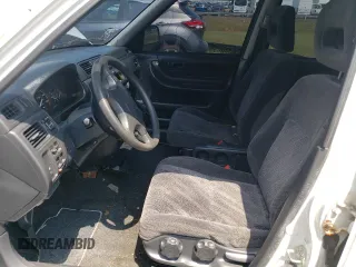 2001 Honda CR-V LX with VIN JHLRD18451S015725, listed as a Copart auction lot 58283554 with 148,344 mi miles and Salvage Title. Bid and sale history available at carsss.com. Image 7.