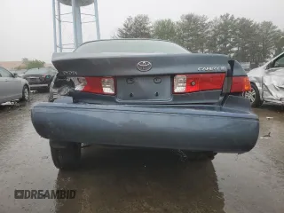 2001 Toyota Camry CE z VIN JT2BG22K710561238, wystawiony jako Copart lot #56686255 z przebiegiem Nie podano mil oraz Szkoda całkowita • Salvage title. Historia ofert i sprzedaży dostępna na DreamBid. Obrazek 6.