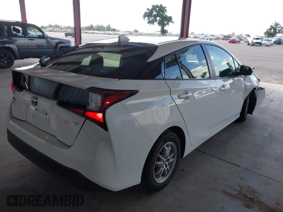 2021 Toyota Prius L Eco z VIN JTDKAMFU5M3146342, wystawiony jako IAAI lot #42249219 z przebiegiem 49 810 mil mil oraz . Historia ofert i sprzedaży dostępna na DreamBid. Obrazek 4.