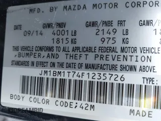 2015 Mazda 3 i SV with VIN JM1BM1T74F1235726, listed as a IAAI auction lot 41899717 with 83,201 mi miles. Bid and sale history available at carsss.com. Image 9.
