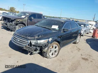 2014 Ford Taurus SEL z VIN 1FAHP2E84EG170133, wystawiony jako IAAI lot #41045369 z przebiegiem 261 732 mil mil oraz . Historia ofert i sprzedaży dostępna na DreamBid. Obrazek 18.