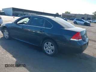 2013 Chevrolet Impala LT with VIN 2G1WG5E34D1221464, listed as a IAAI auction lot 40400538 with 146,571 mi miles and . Bid and sale history available at DreamBid. Image 3.
