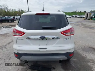 2016 Ford Escape Titanium with VIN 1FMCU9J98GUA00832, listed as a IAAI auction lot 42188941 with 90,764 mi miles and . Bid and sale history available at DreamBid. Image 16.