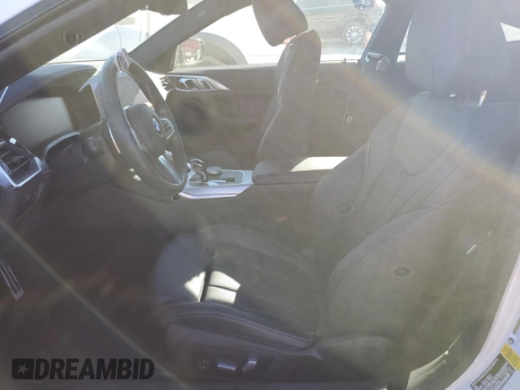 2023 BMW 4 Series 430i with VIN WBA53AP06PCL93808, listed as a Copart auction lot 40823274 with 9,338 mi miles and . Bid and sale history available at DreamBid. Image 7.