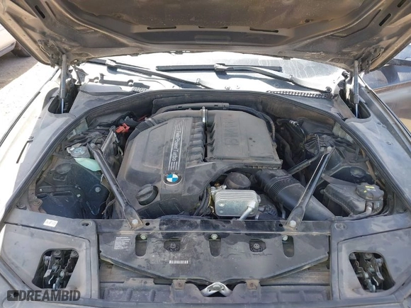 2014 BMW 5 Series 535i with VIN WBA5B1C51ED483069, listed as a IAAI auction lot 41945334 with 135,871 mi miles. Bid and sale history available at carsss.com. Image 10.