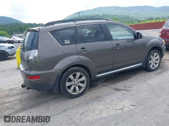 2010 Mitsubishi Outlander XLS z VIN JA4JT4AX6AZ003099, wystawiony jako IAAI lot #42458993 z przebiegiem 218 614 mil mil oraz . Historia ofert i sprzedaży dostępna na DreamBid. Obrazek 4.