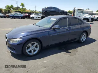 2013 BMW 3 Series 328i with VIN WBA3A5C52DF353760, listed as a Copart auction lot 62737045 with 129,354 mi miles and Salvage title. Bid and sale history available at DreamBid. Image 1.