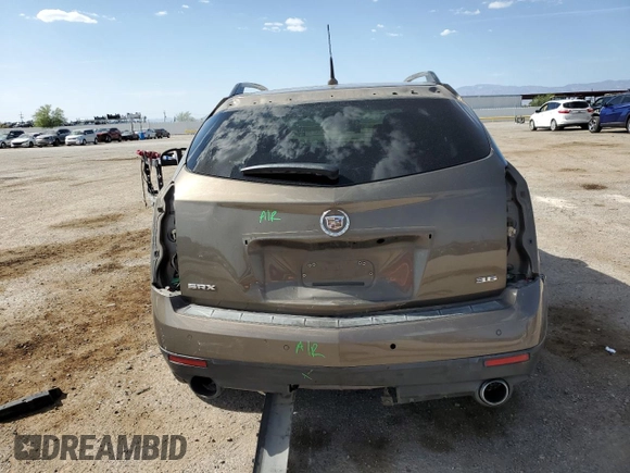 2014 Cadillac SRX Premium Collection z VIN 3GYFNDE37ES644966, wystawiony jako Copart lot #60501715 z przebiegiem 97 231 mil mil oraz Szkoda całkowita • Salvage title. Historia ofert i sprzedaży dostępna na DreamBid. Obrazek 6.
