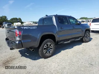 2022 Toyota Tacoma SR z VIN 3TYCZ5AN8NT076536, wystawiony jako Copart lot #55268985 z przebiegiem 57 697 mil mil oraz Szkoda całkowita • Salvage title. Historia ofert i sprzedaży dostępna na DreamBid. Obrazek 3.