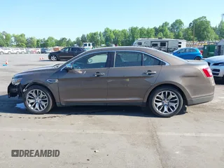 2016 Ford Taurus Limited z VIN 1FAHP2F81GG109548, wystawiony jako IAAI lot #42177871 z przebiegiem 168 611 mil mil oraz . Historia ofert i sprzedaży dostępna na DreamBid. Obrazek 14.
