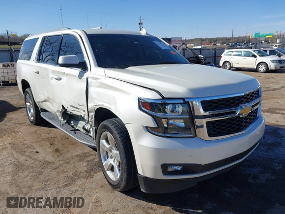 2015 Chevrolet Suburban LT with VIN 1GNSKJKC9FR717038, listed as a IAAI auction lot 41815942 with 123,095 mi miles and . Bid and sale history available at DreamBid. Image 1.