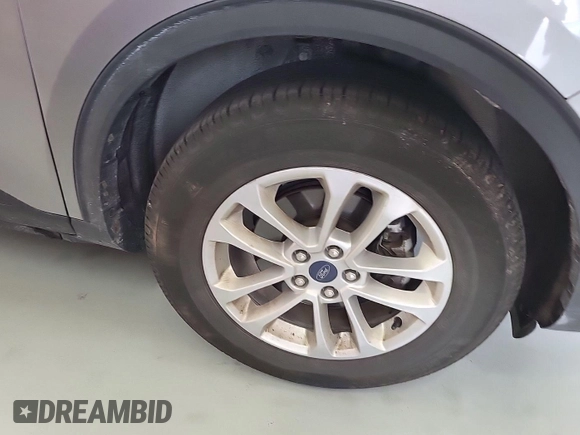 2022 Ford Escape SE z VIN 1FMCU9G66NUB33504, wystawiony jako IAAI lot #42748133 z przebiegiem 74 338 mil mil oraz . Historia ofert i sprzedaży dostępna na DreamBid. Obrazek 31.