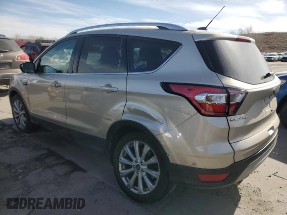 2017 Ford Escape Titanium with VIN 1FMCU9JD8HUE83650, listed as a Copart auction lot 48498245 with 103,920 mi miles and Salvage Title. Bid and sale history available at carsss.com. Image 2.