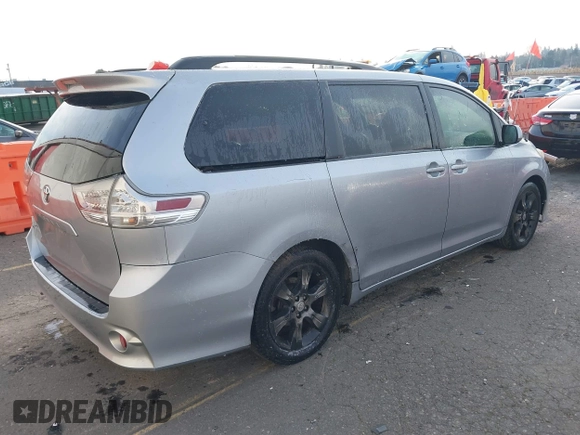 2011 Toyota Sienna SE with VIN 5TDXK3DC4BS070311, listed as a IAAI auction lot 41379741 with 138,589 mi miles. Bid and sale history available at carsss.com. Image 4.