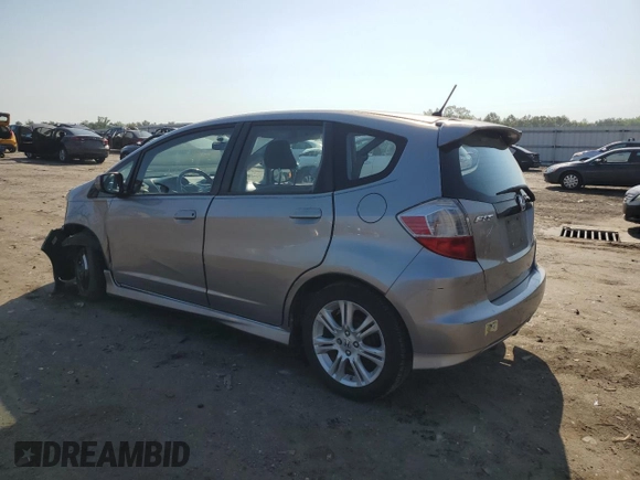 2010 Honda Fit Sport with VIN JHMGE8H47AS023964, listed as a Copart auction lot 61797995 with 78,518 mi miles and Salvage title. Bid and sale history available at DreamBid. Image 2.