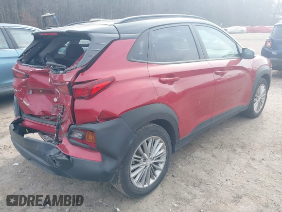 2019 Hyundai Kona SEL with VIN KM8K22AA5KU390896, listed as a IAAI auction lot 41469809 with 54,025 mi miles. Bid and sale history available at carsss.com. Image 4.