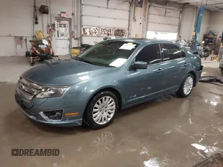 2012 Ford Fusion Hybrid z VIN 3FADP0L31CR443545, wystawiony jako IAAI lot #42028774 z przebiegiem 194 365 mil mil oraz . Historia ofert i sprzedaży dostępna na DreamBid. Obrazek 17.