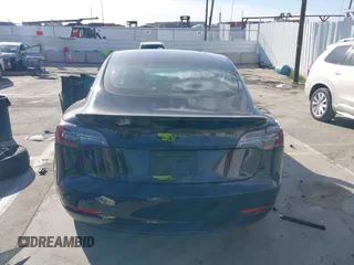 2019 Tesla Model 3 Mid Range with VIN 5YJ3E1EA0KF399082, listed as a IAAI auction lot 41697100 with 138,998 mi miles and . Bid and sale history available at carsss.com. Image 16.