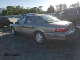 2004 Mercury Sable LS Premium with VIN 1MEHM55S84A614002, listed as a Copart auction lot 56582965 with 185,589 mi miles and Salvage title. Bid and sale history available at DreamBid. Image 2.