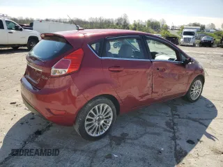 2014 Ford Fiesta Titanium z VIN 3FADP4FJ0EM156814, wystawiony jako Copart lot #52028435 z przebiegiem 97 985 mil mil oraz Szkoda całkowita • Salvage title. Historia ofert i sprzedaży dostępna na DreamBid. Obrazek 3.