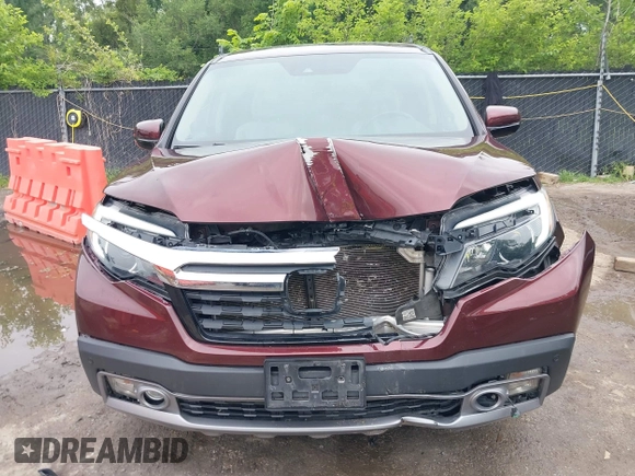 2019 Honda Ridgeline RTL-E with VIN 5FPYK3F78KB004781, listed as a IAAI auction lot 42425646 with 147,695 mi miles and . Bid and sale history available at DreamBid. Image 6.