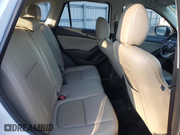 2016 Mazda CX-5 Sport with VIN JM3KE2BY3G0877107, listed as a Copart auction lot 87621635 with 83,093 mi miles and Salvage Title. Bid and sale history available at carsss.com. Image 12.