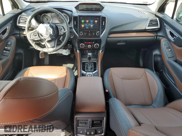 2023 Subaru Forester Touring с VIN JF2SKARC5PH522318, выставлен на аукционе Copart как лот 66967095 с пробегом 12 038 миль миль и Списание • Salvage title. История ставок и продаж доступна на DreamBid. Изображение 8.
