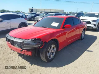 2020 Dodge Charger SXT with VIN 2C3CDXBG3LH215820, listed as a IAAI auction lot 42064604 with 90,695 mi miles and . Bid and sale history available at DreamBid. Image 2.