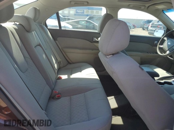 2012 Ford Fusion SE z VIN 3FAHP0HA0CR193143, wystawiony jako Copart lot #62696565 z przebiegiem 150 562 mil mil oraz Szkoda całkowita • Salvage title. Historia ofert i sprzedaży dostępna na DreamBid. Obrazek 10.