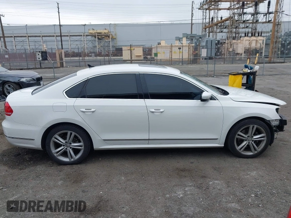 2015 Volkswagen Passat 1.8T SE w/Sunroof & Nav with VIN 1VWBT7A31FC043798, listed as a IAAI auction lot 42108289 with 132,442 mi miles. Bid and sale history available at carsss.com. Image 14.