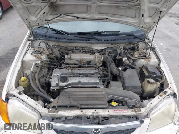 2000 Mazda Protege DX with VIN JM1BJ2220Y0273953, listed as a IAAI auction lot 41956058 with 158,837 mi miles and . Bid and sale history available at DreamBid. Image 10.