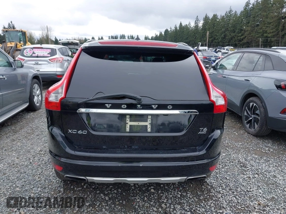 2014 Volvo XC60 R-Design Premier Plus z VIN YV4902DZ7E2553989, wystawiony jako IAAI lot #41919724 z przebiegiem 145 952 mil mil oraz . Historia ofert i sprzedaży dostępna na DreamBid. Obrazek 16.