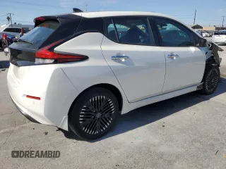 2023 Nissan LEAF SV Plus with VIN 1N4CZ1CVXPC557206, listed as a Copart auction lot 46681545 with 61,179 mi miles and Salvage Title. Bid and sale history available at DreamBid. Image 3.