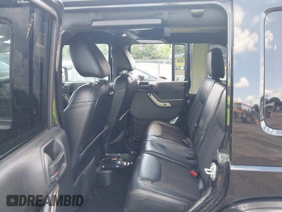 2017 Jeep Wrangler Unlimited Sahara with VIN 1C4BJWEGXHL520182, listed as a IAAI auction lot 42616692 with 88,169 mi miles and . Bid and sale history available at DreamBid. Image 8.